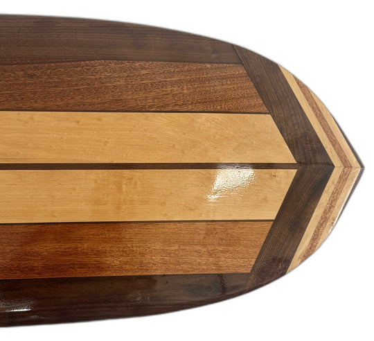 Close-up of the Sculptural Alaia's hand-inlaid walnut, maple, and mahogany nose detail
