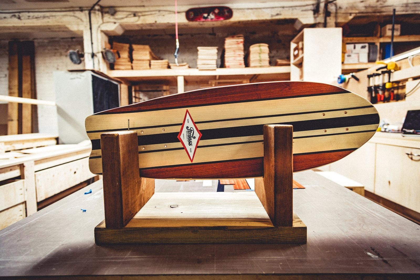 A veneer Finless board on a stand in the first shop